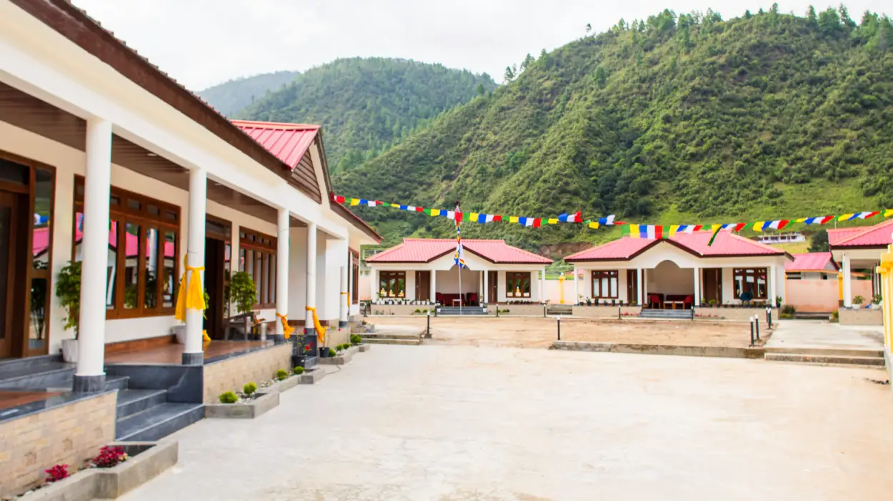 Beautiful cottages with mountain backdrop at Rivero Resort